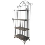 A WROUGHT-IRON FOUR TIER SHELF UNIT, 20TH CENTURY, arch top with scroll work decoration 158 x 80 x