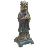 BRONZE FIGURE A DAOIST IMMORTAL 17TH / 18TH CENTURY the figure is shown seated with the hands held