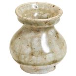 A SMALL YUEYAO CELADON SPITTOON Southern Dynasties (AD 420-589) of baluster form 6cm high