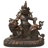 GILT COPPER ALLOY FIGURE OF VAISHRAVANA SINO-TIBETAN, 18TH CENTURY the deity cast in lalitasana atop