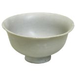A 'SHUFU' WHITE-GLAZED CUP YUAN DYNASTY (1279 - 1368) the well potted flared sides covered in an