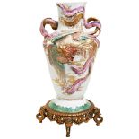 A JAPANESE PORCELAIN AND GILT-METAL MOUNTED VASE MEIJI PERIOD the baluster sides with ornate high