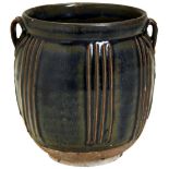 A 'CIZHOU' BLACK-GLAZED RIBBED JAR NORTHERN SONG / JIN DYNASTY the baluster sides decorated with six