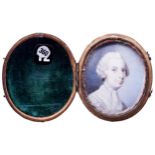 ENGLISH SCHOOL, 18TH CENTURY, MINIATURE PORTRAIT OF A GENTLEMAN in a hinged fish skin case. 5.3