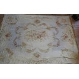 A LARGE AUBUSSON RUG, 20TH CENTURY, central cream cartouche decorated with floral sprays and