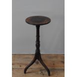 A REGENCY MAHOGANY WINE TABLE, CIRCA 1780, the circular fluted edge top raised on ring turned