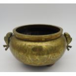 A CHINESE POLISHED BRONZE CENSER, REPUBLIC PERIOD, compressed globular form, with twin fish handles,