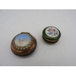 TWO VINTAGE FRENCH ENAMELLED PILL BOXES, CIRCA 1920, the larger a cobalt blue circular box decorated