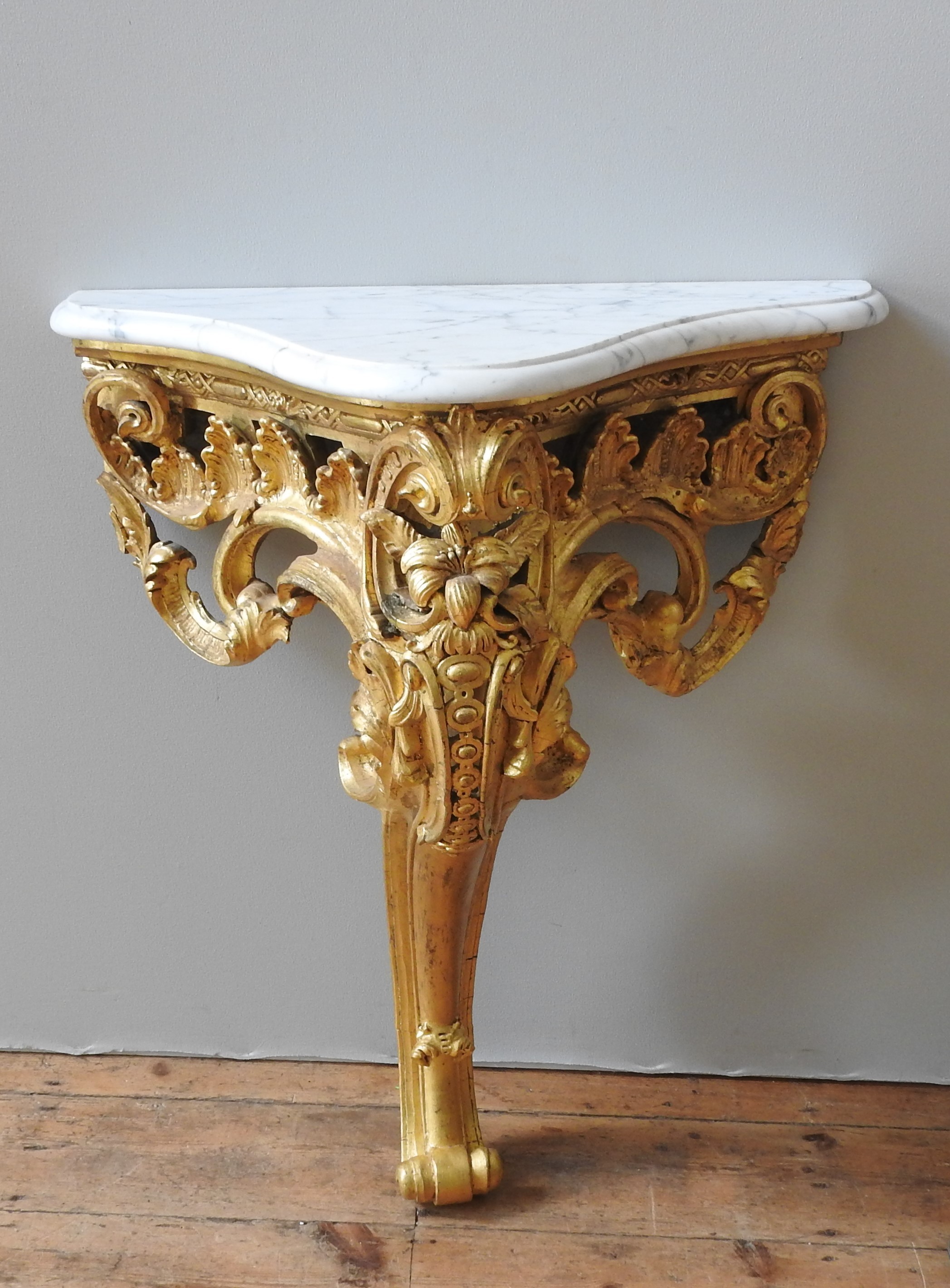 A LATE 19TH CENTURY FRENCH GILT WOOD CONSOLE TABLE, in the Rococo style, ornate carved scroll - Image 3 of 3