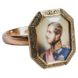 A VICTORIAN YELLOW METAL PORTRAIT RING DEPICTING PRINCE ALBERT, in a rectangular octagonal