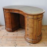 A VICTORIAN BURR WALNUT AND TULIP WOOD BANDED DESK BY GILLOWS, CIRCA 1860, elegant kidney shape form