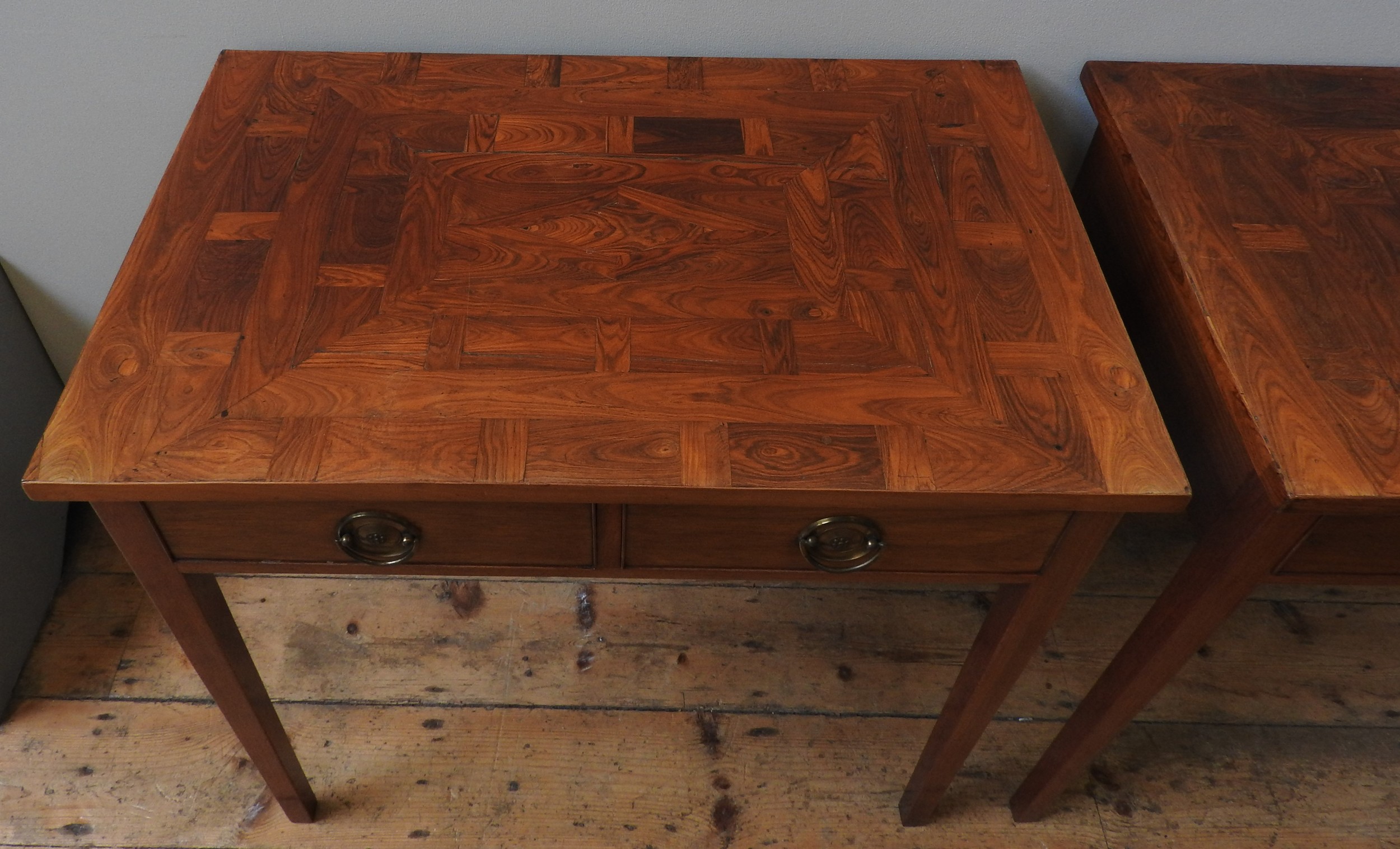 A PAIR OF PADOUK SIDE TABLES, CIRCA 1810, the parquertry veneer rectangular tops above two frieze - Image 2 of 3