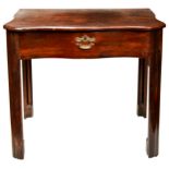 A GOOD GEORGE III MAHOGANY SERPENTINE WRITING TABLE, CIRCA 1760, the shaped top with moulded edge,