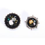 A 19TH CENTURY PIETRA DURA FLORAL BROOCH, in a silver mount with yellow metal studs, and another