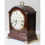 A REGENCY STYLE MAHOGANY BRACKET CLOCK, EARLY 20TH CENTURY, retailed by Maple & Co. Ltd, arched