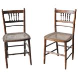 A PAIR OF REGENCY FAUX BAMBOO CHAIRS, CIRCA 1820, floral painted top rail over knopped baluster