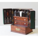 AN EARLY 19TH CENTURY MAHOGANY APOTHECARY CABINET, compact rectangular form with inset brass