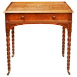 A GOOD VICTORIAN POLLARDED OAK WRITING TABLE, CIRCA 1840, the 3/4 gallery top with a central ratchet