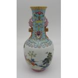 A CHINESE FAMILLE ROSE BOTTLE VASE, Republic Period (1912-1949), the neck decorated in the typical