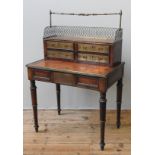 A ROSEWOOD AND WALNUT BONHEUR DU JOUR, EARLY 19TH CENTURY, the rectangular top with three quarter