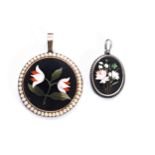 A 19TH CENTURY PIETRA DURA CIRCULAR FLORAL PENDANT, with seed pearl and yellow metal border, and a