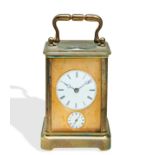 A FRENCH FOUR GLASS BRASS EIGHT DAY CHIMING CARRIAGE CLOCK, EARLY 20TH CENTURY, with engine