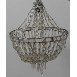 A VINTAGE CIRCULAR CHANDELIER, CIRCA 1935, hung with cascading rows of oval shaped drops 39 cm diam
