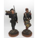 A PAIR OF LATE 19TH CENTURY SPELTER FIGURES, AFTER EMILE GUILLEMIN, modelled as bandsmen of the