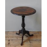 A VICTORIAN FIGURED WALNUT OCCASIONAL TABLE, CIRCA 1870, the circular top with an elegant scroll