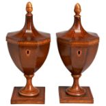 A PAIR OF GEORGE III SATINWOOD INLAID TEA CADDIES, urn form, the hinged covers with acorn finials,