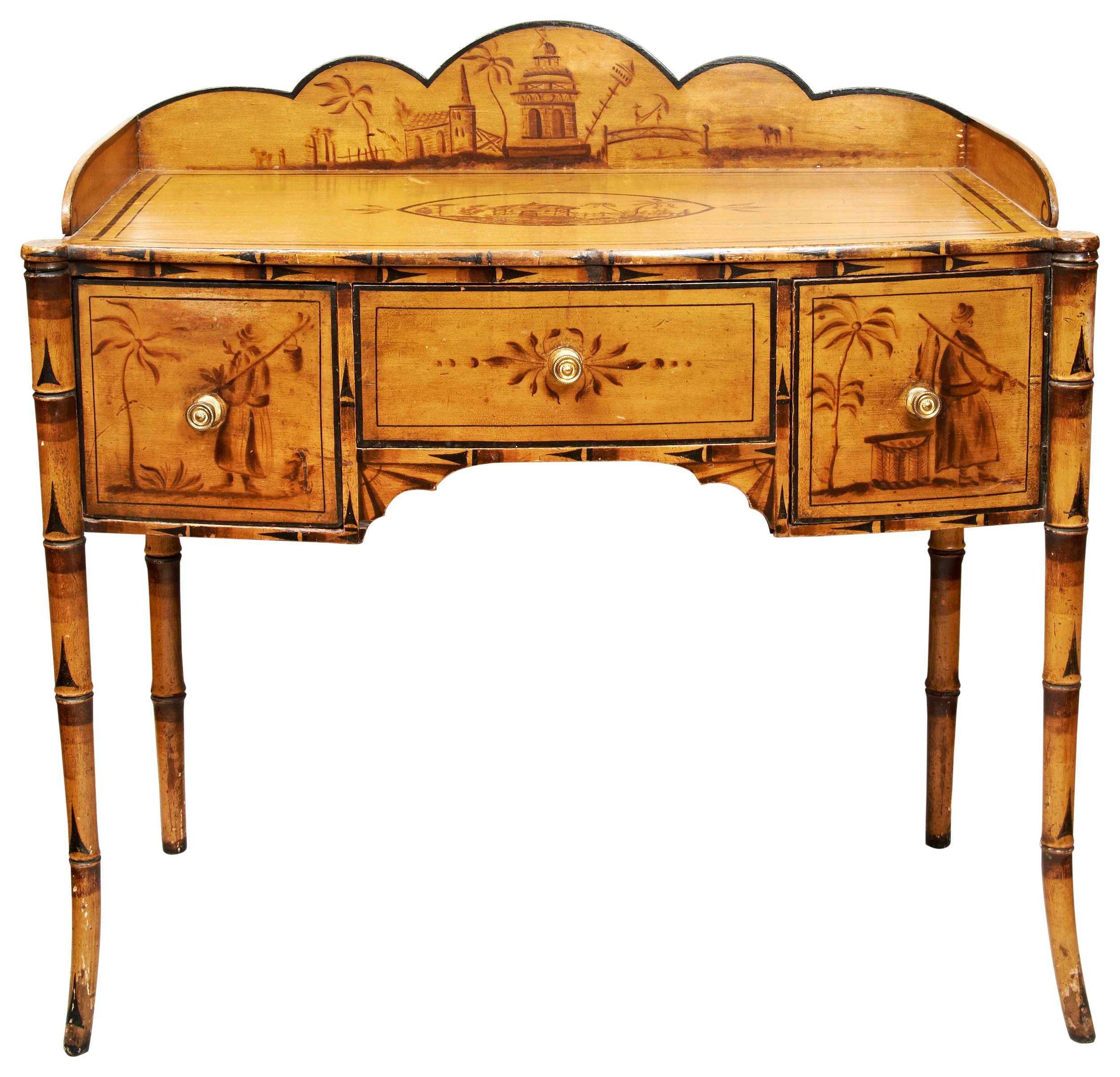 A REGENCY SIMULATED BAMBOO AND CHINOISERIE DRESSING TABLE, CIRCA 1820, the shaped three quarter