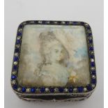 A VINTAGE FRENCH WHITE METAL PILL BOX, square form, the hinged lid decorated with a portrait