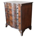 A MAHOGANY SERPENTINE CHEST OF DRAWERS, CIRCA 1920, with a brushing slide above four graduated