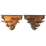 A PAIR OF ITALIAN STYLE GILT WOOD WALL BRACKETS, EARLY 20TH CENTURY, split level shelves mounted