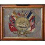 AN 18TH CENTURY NEEDLEPOINT PICTURE OF HMS EDGAR, in central circular cartouche, surrounded by the