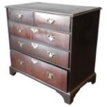 A GEORGE III WALNUT CHEST OF DRAWERS, CIRCA 1790, moulded edge top above two short drawers and three
