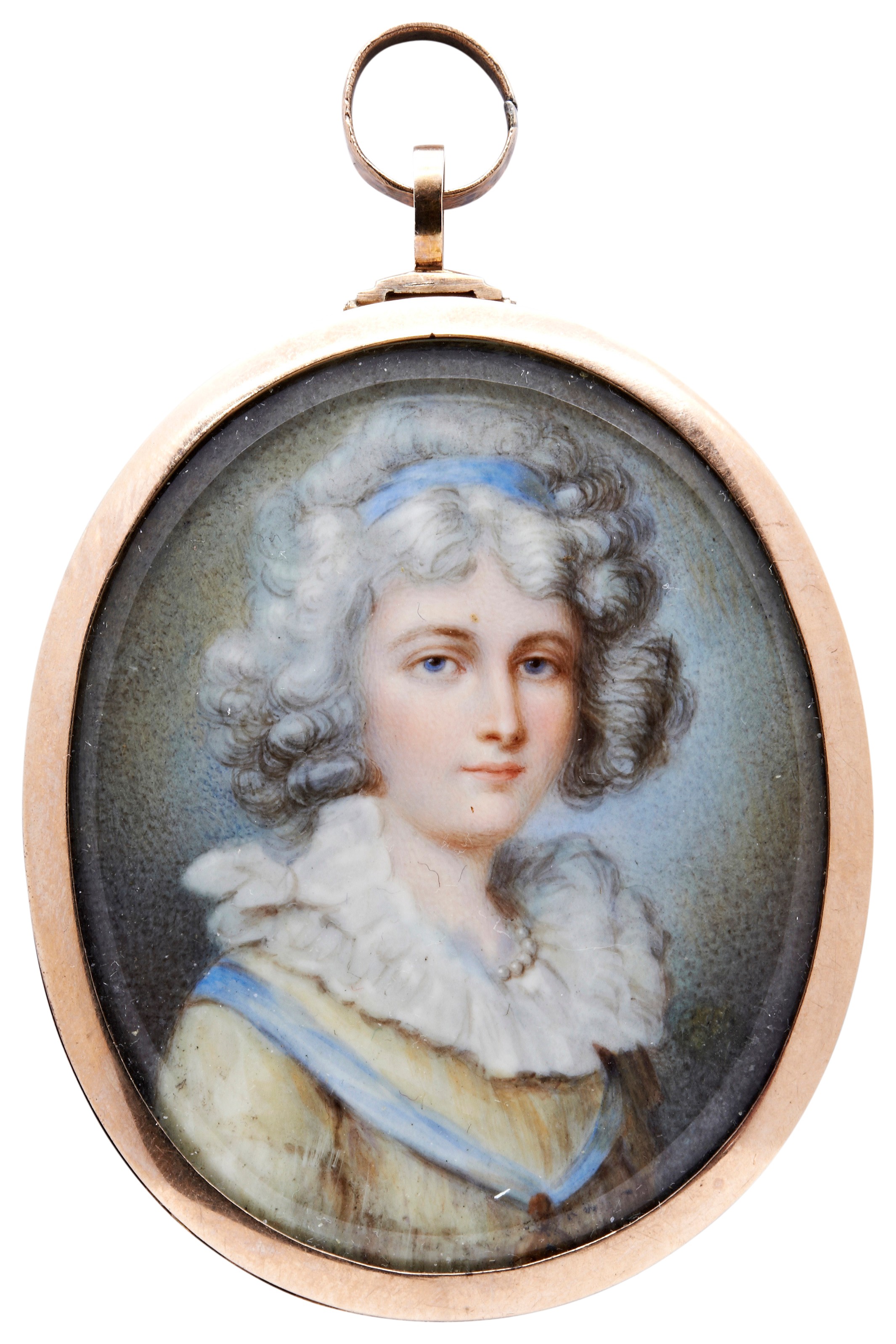 A LATE 18TH CENTURY PORTRAIT MINATURE OF A LADY, with ribbon tied hair, yellow gown and large
