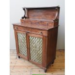 A REGENCY MAHOGANY CHIFFONIER, CIRCA 1820, three quarter brass galleried shelf on scrolling supports