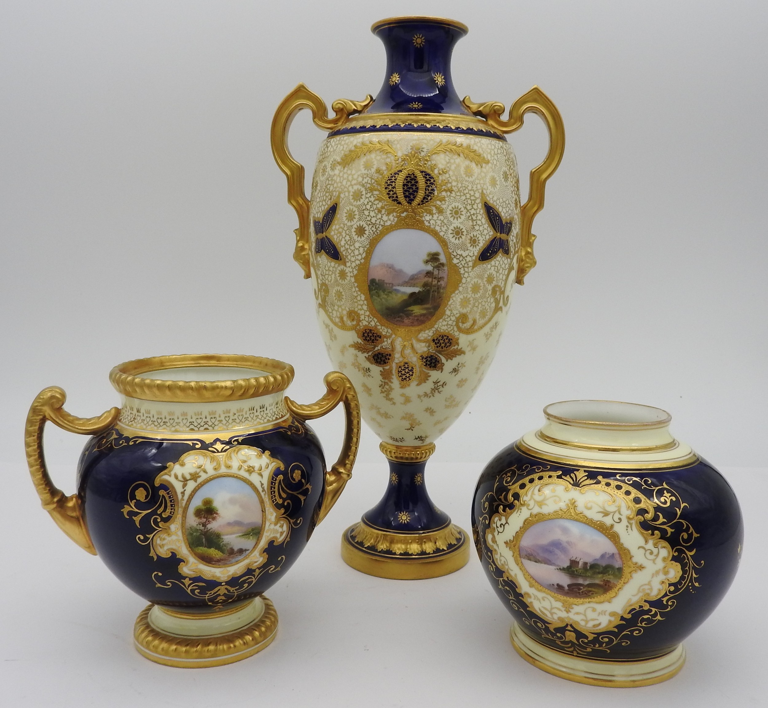 THREE COALPORT HAND PAINTED VASES, 20TH CENTURY, thelot comprised of a tall amphora shape vase,