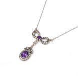 AN AMETHYST AND DIAMOND PENDANT, CIRCA 1900 the oval mixed-cut amethyst collet set within a border