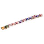 GOLD AND ENAMEL FLAGS OF THE NATIONS BRACELET the eighteen enamel plaques each with an enamelled