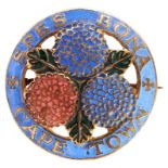 OMAR RAMSDEN; A LATE NINETEENTH CENTURY ENAMEL AND BRONZE GILDED BROOCH the front depicting three