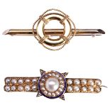 A LATE VICTORIAN ENAMEL PEARL AND DIAMOND BROOCH, CIRCA 1880 the central half pearl within a seed
