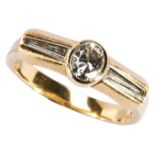 A DIAMOND DRESS RING the oval mixed-cut diamond collet set between tapering baguette-cut diamond