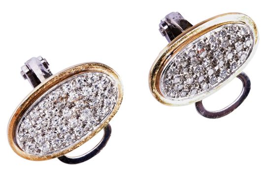 A PAIR OF DIAMOND EARCLIPS the oval discs pave set with eight-cut diamonds, in two colour mount.