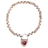 A VICTORIAN GARNET AND GOLD BRACELET, CIRCA 1860 the circular faceted links with pierced spacers and