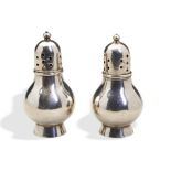 A MINIATURE PAIR OF SUGAR CASTERS, DAVID CLAYTON LONDON C.1720. A matching pair of squat baluster