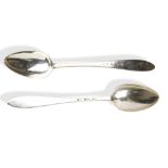 A PAIR OF LARGE LIMERICK SERVING SPOONS. The stems engraved in Irish bright star pattern. Both