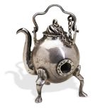 A MINIATURE TEA KETTLE WITH INTERNAL BURNER, CONTINENTAL POSS. DUTCH, C. 1740. The pot appears to