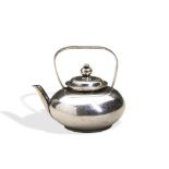 A MINIATURE TEA KETTLE, POSSIBLY DUTCH C.1740. Marked on the base, unidentified.  5 cm. wide. 30